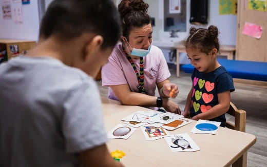 a group of people sitting at a table