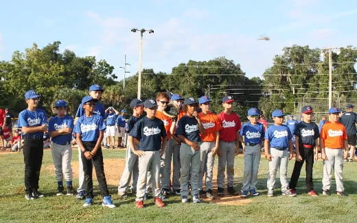a group of people in baseball uniforms