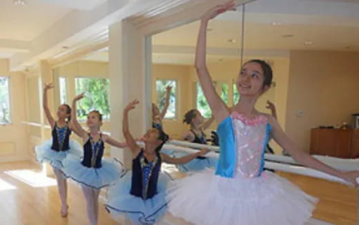 a group of children dancing