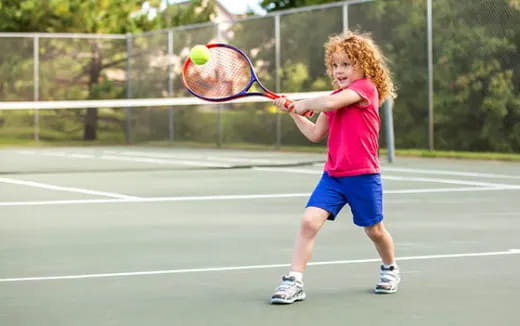 a girl playing tennis