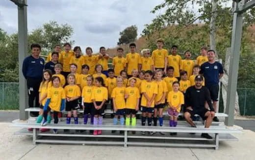 a group of people posing for a photo