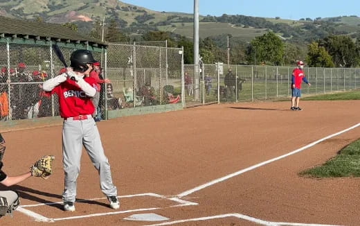 a baseball player holding a bat