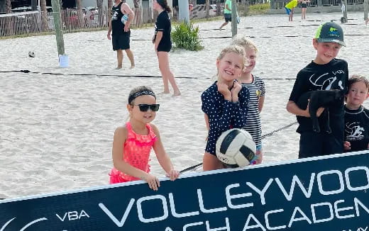 a group of people on a beach