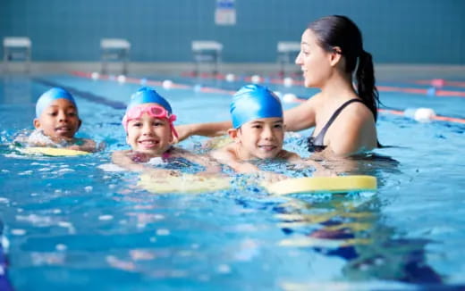 a group of people in a pool