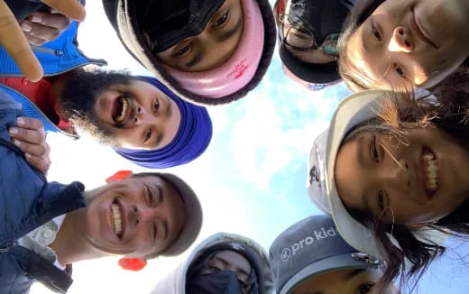 a group of people posing for the camera