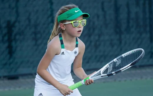 a woman playing tennis