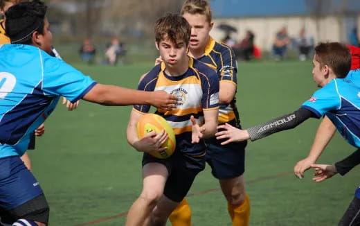 a group of men playing rugby