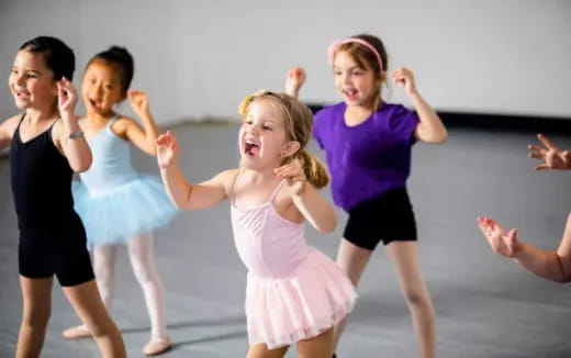 a group of children dancing