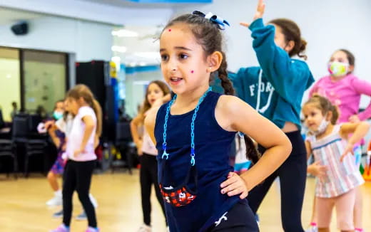 a group of children dancing