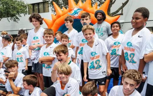 a group of people wearing matching t-shirts