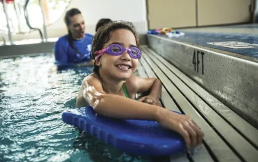 a girl in a pool