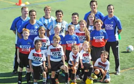 a group of people posing for a photo