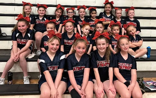 a group of girls posing for a photo