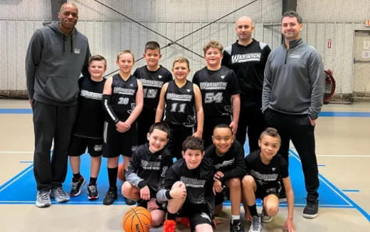 a group of people posing for a photo