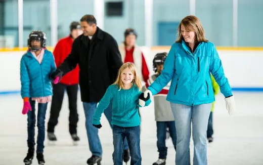 a group of people ice skating