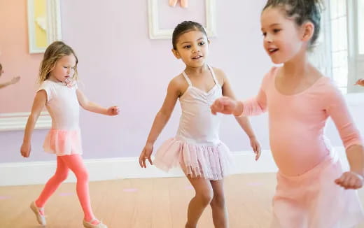 a group of children dancing