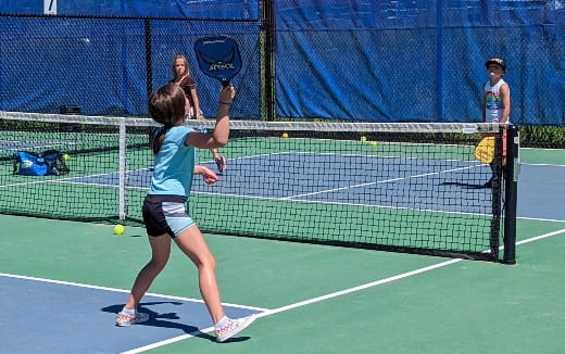 a woman playing tennis