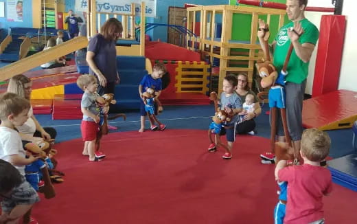 a group of children playing in a playroom