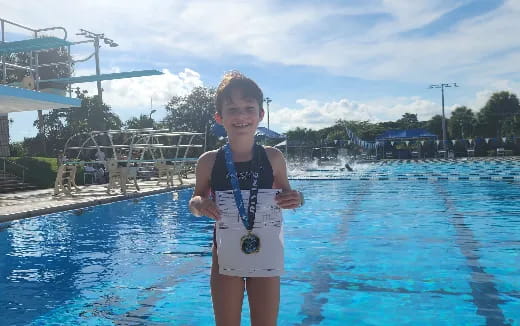 a boy in a pool