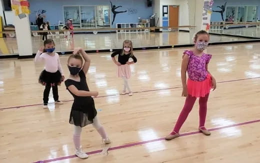 a group of children dancing