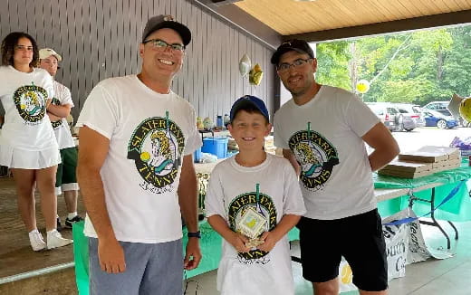 a group of people posing for a photo