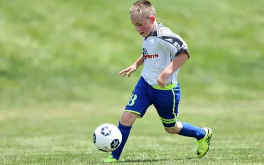 a boy playing football