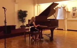 a person playing a piano