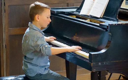 a child playing a piano