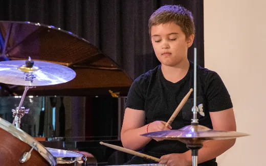 a person playing drums