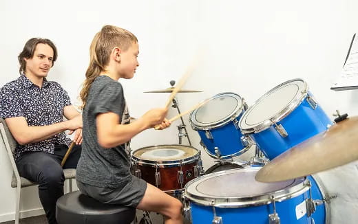 a person playing drums