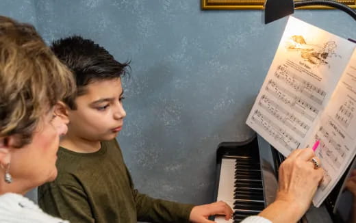 a person playing a piano