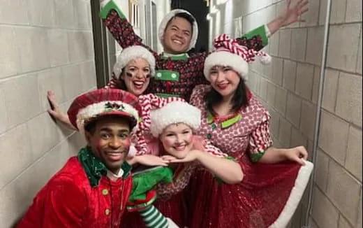 a group of people wearing hats