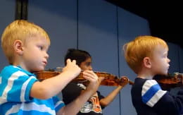 a group of boys eating