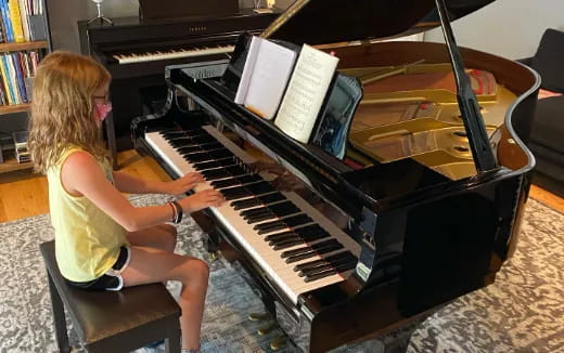 a person playing a piano