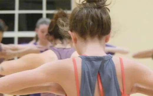 a group of people in a gym