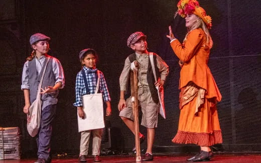 a group of people on a stage