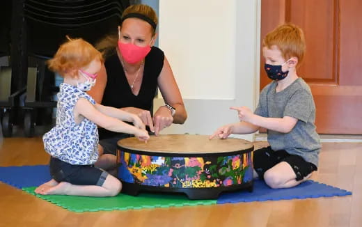 a group of kids wearing masks