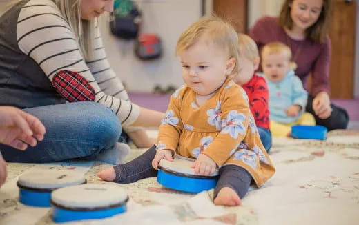 a person and a group of children