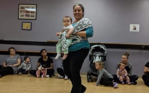 a person holding a baby