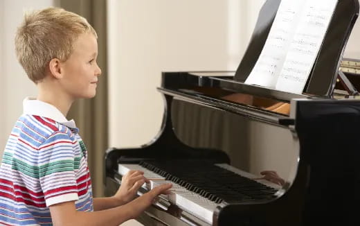 a child playing a piano