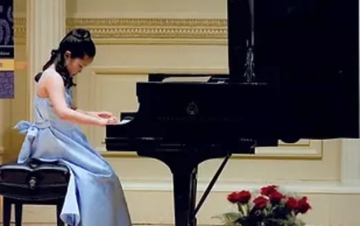 a person playing a piano