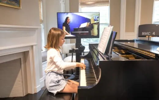 a person playing a piano