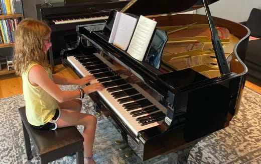 a person playing a piano