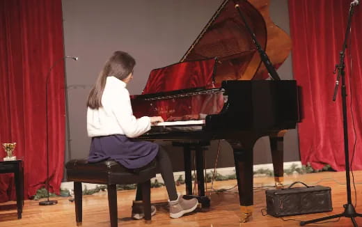 a person playing a piano