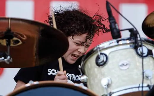 a person playing drums