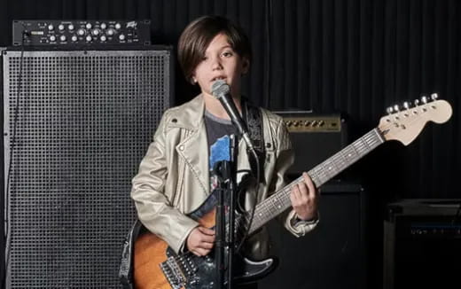 a person playing a guitar