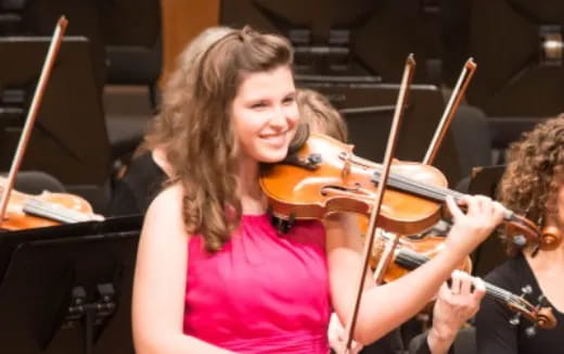 a person playing a violin