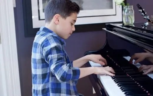 a person playing a piano