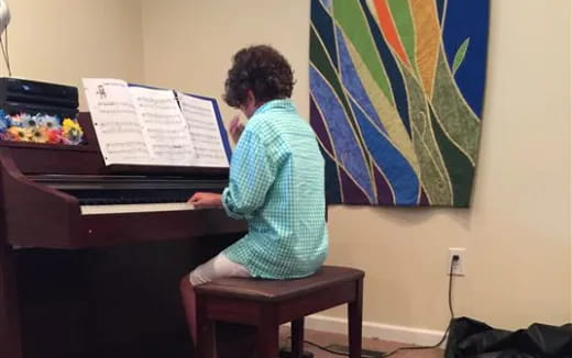 a man playing a piano