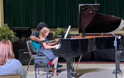 a person playing a piano